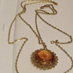 Vintage gold tone long necklace with large stone centre and starburst design